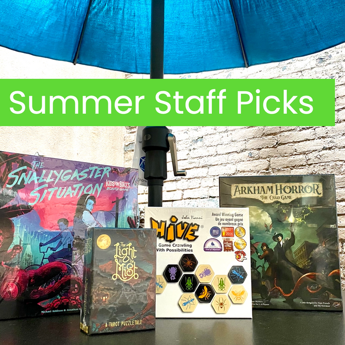 Spotlight July 2022 Staff Picks - 4 games on a table: Kids on Bikes, The Light in the Mist, Hive and Arkham Horror the Card Game