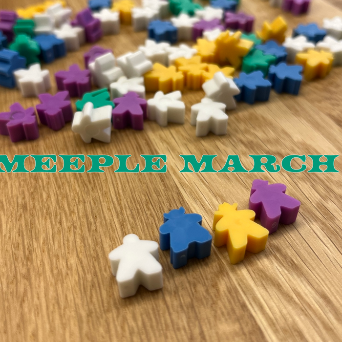 Board Game Meeples on a wood background 